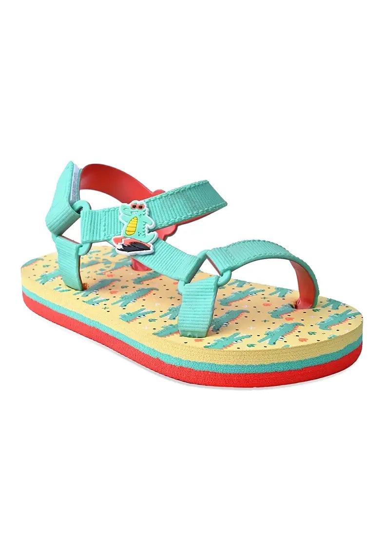 Youth boys’ sandal with a surfing croc print.