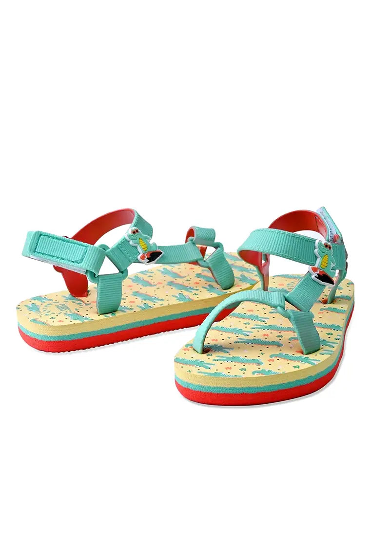 Youth boys’ sandal with a surfing croc print.